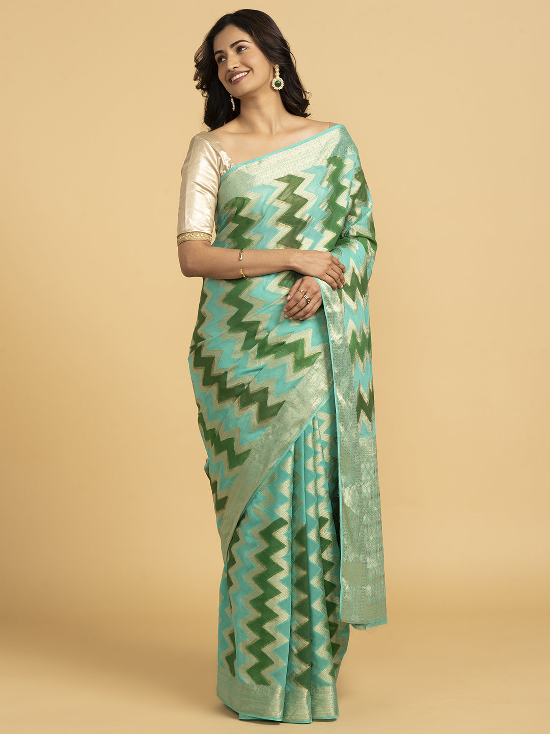 Divine Drapes Ikat Design Green And Gold Saree