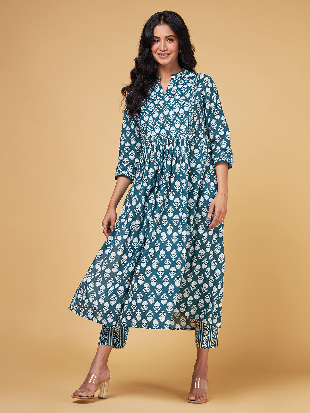 Blooming Melodies A-line Teal Kurta Set