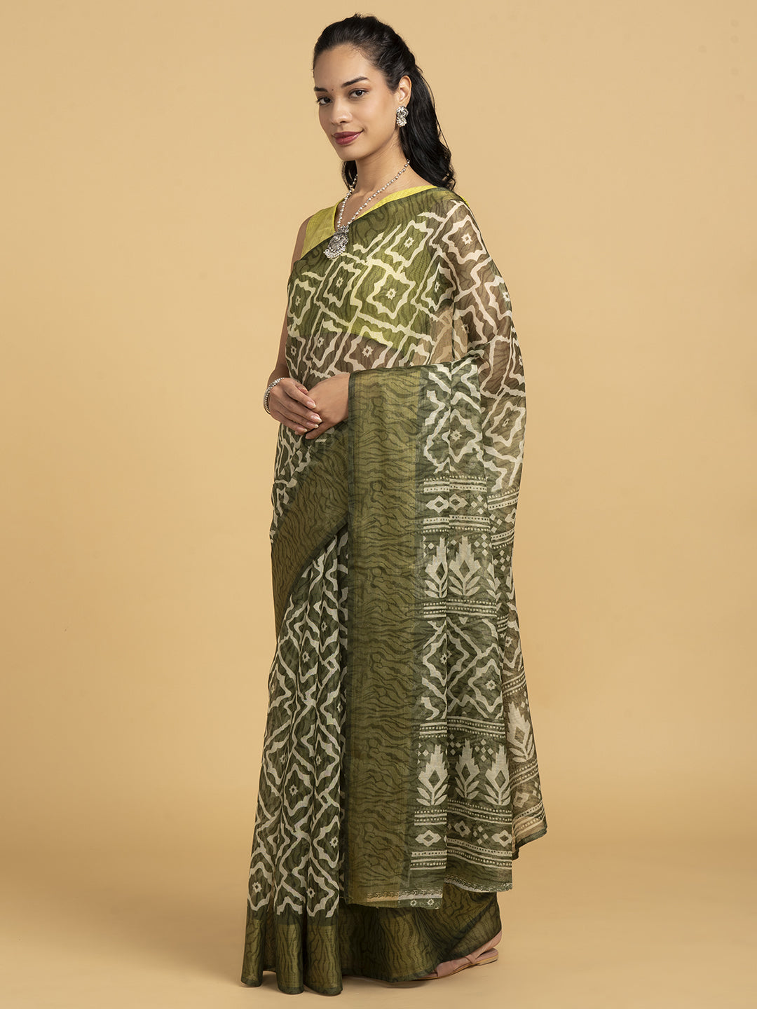 Divine Drapes Green Ikat Design Saree