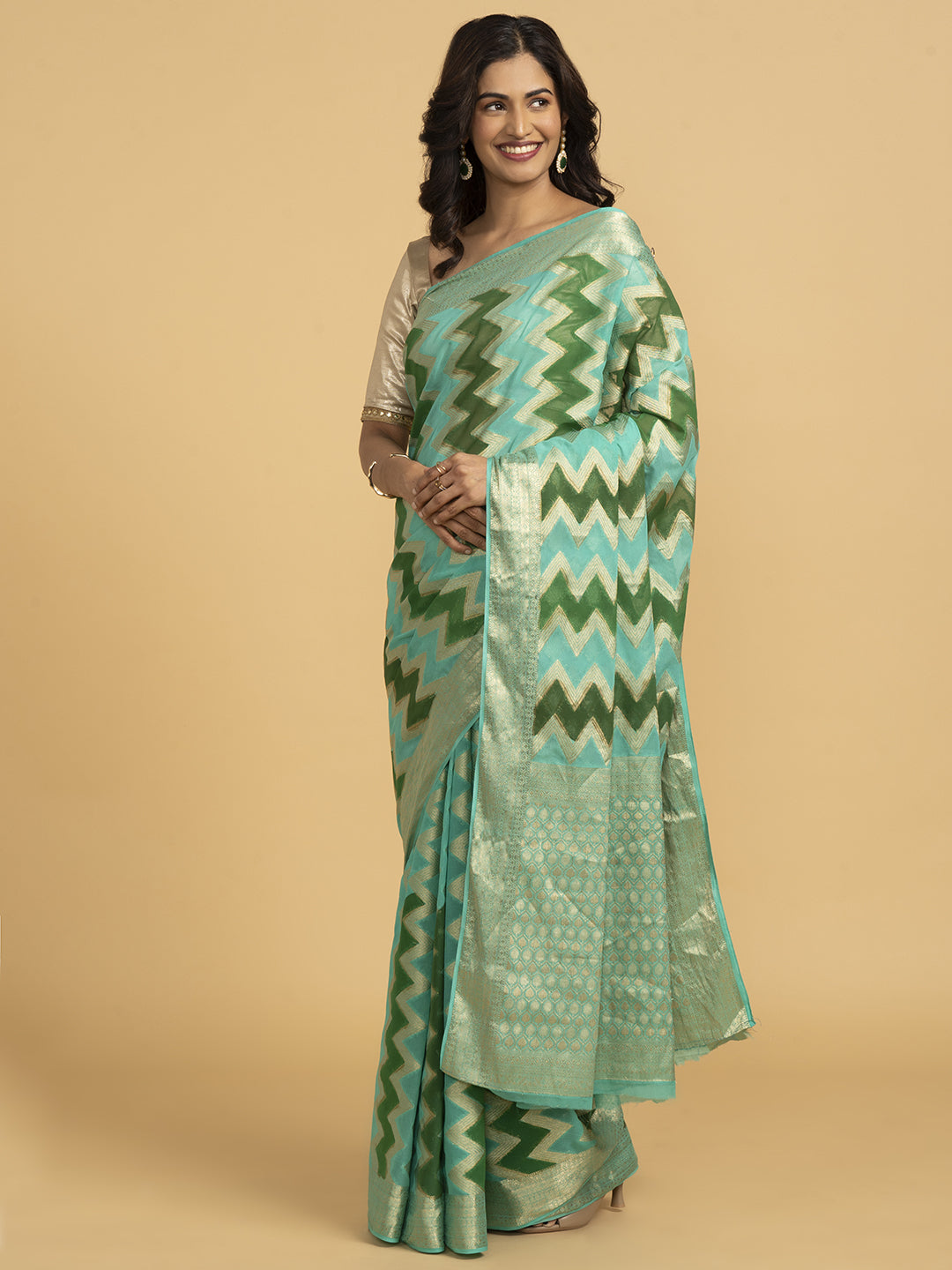 Divine Drapes Ikat Design Green And Gold Saree