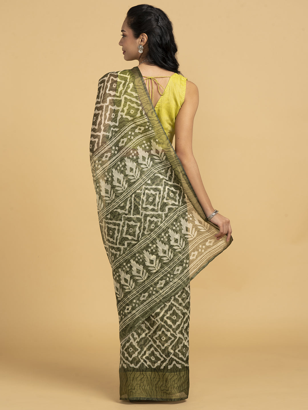 Divine Drapes Green Ikat Design Saree