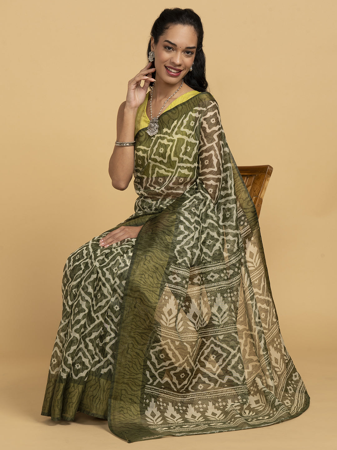 Divine Drapes Green Ikat Design Saree