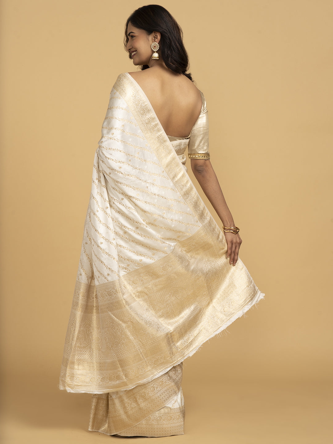 Divine Drapes White Golden Embellished Saree