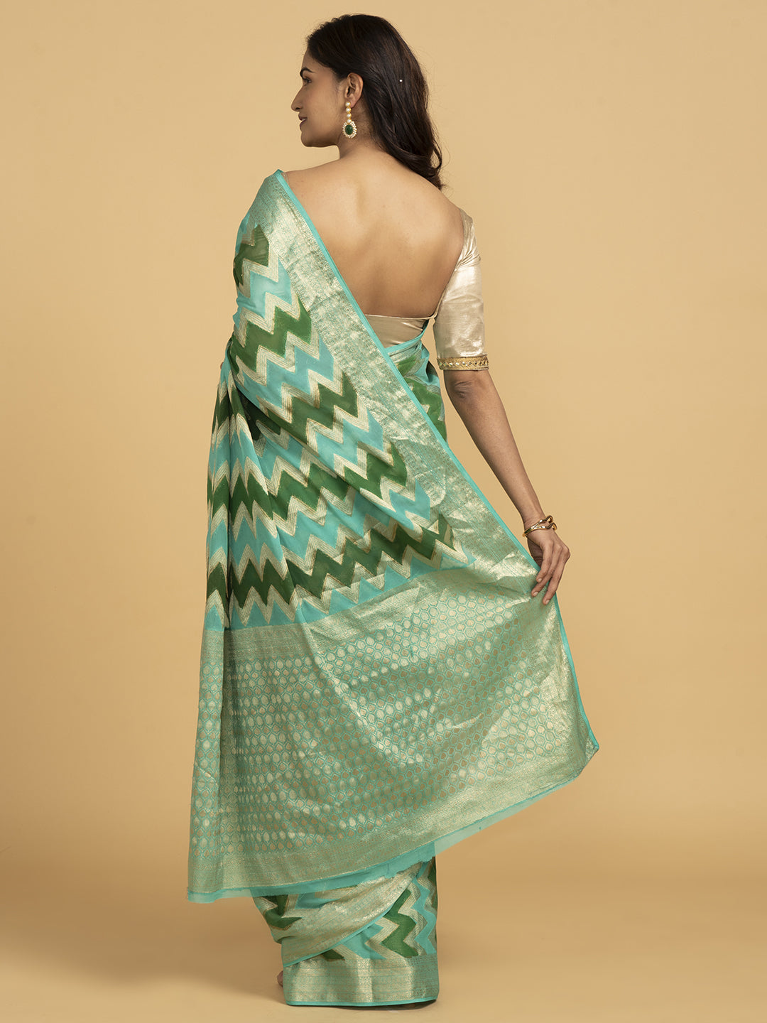 Divine Drapes Ikat Design Green And Gold Saree