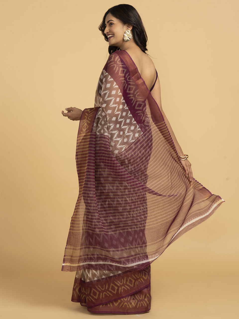 Divine Drapes Peach Ikat Design saree