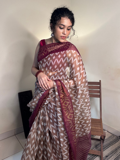 Divine Drapes Peach Ikat Design saree